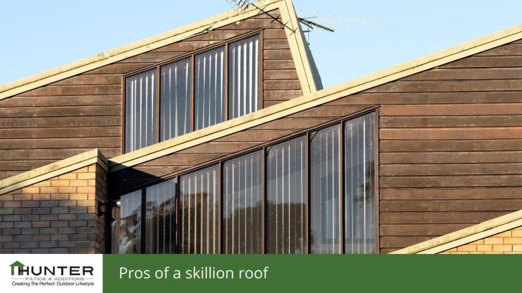 Pros of a skillion roof Modern house with sloped roof and large windows.
