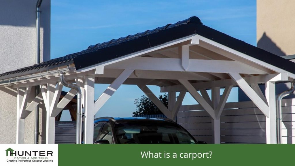 Adding a Carport to Your Home - Carport What is a carport? - Photo of a car under a free standing carport.