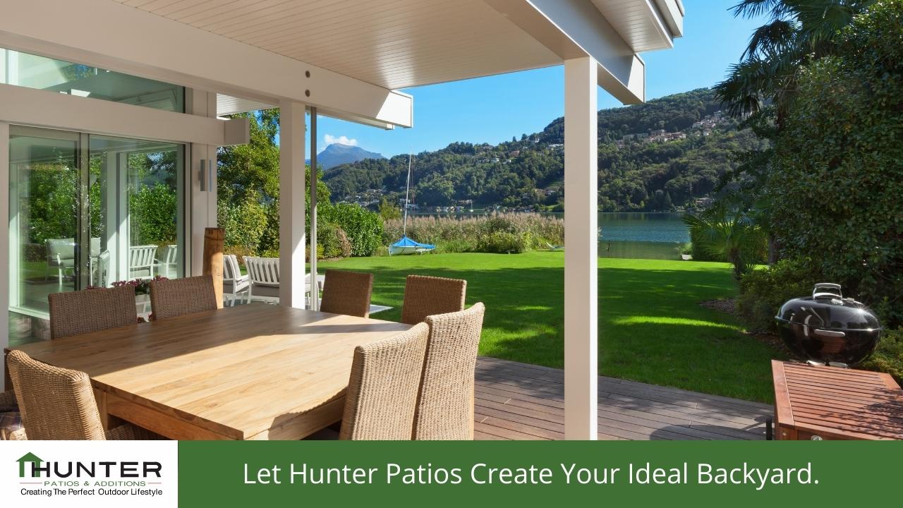 Scenic backyard patio with lake view.