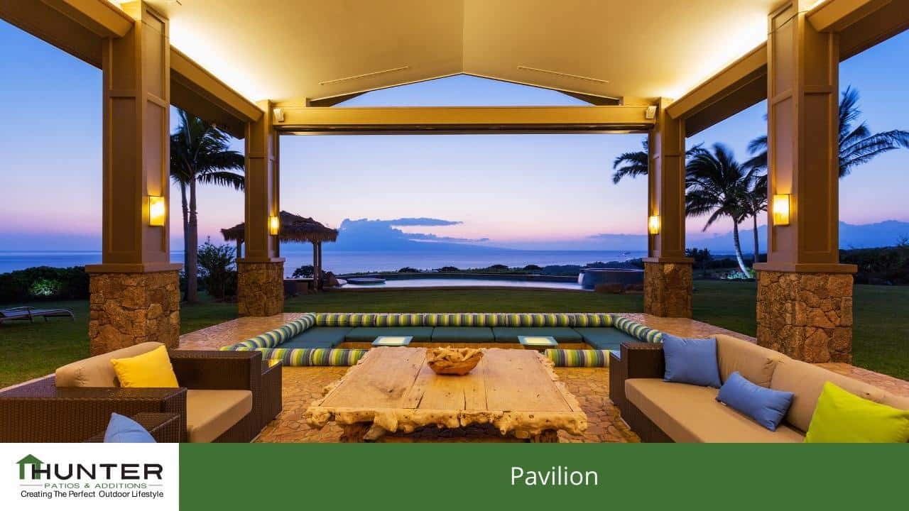 Oceanview pavilion at sunset with cozy seating