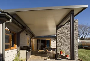 Modern patio with awning and outdoor furniture